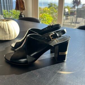 Stuart Weitzman size 8 Medium black open toe heels with brass heel accents